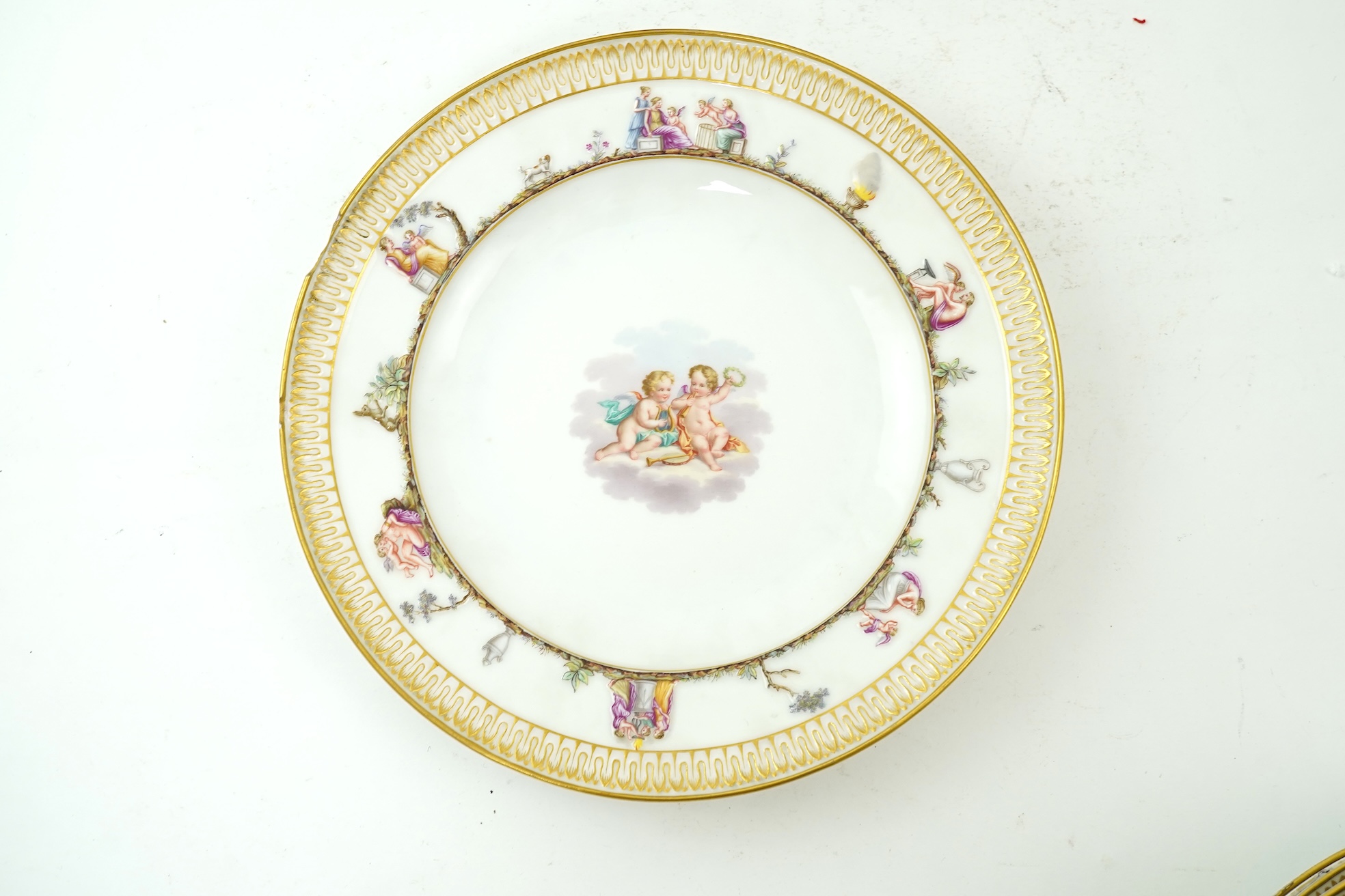 A set of six Meissen plates, decorated in the Capodimonte style, late 19th century